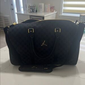 Jordan Black and Gold duffle bag